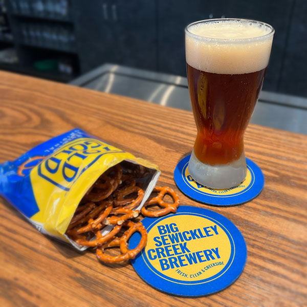 Bock Again Beer with Coasters and Pretzels